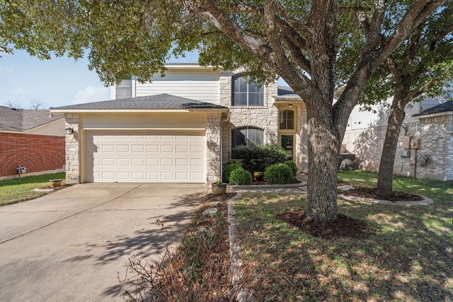 view of front of property with a garage