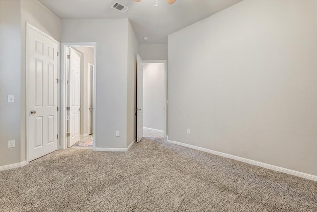 unfurnished bedroom with light colored carpet