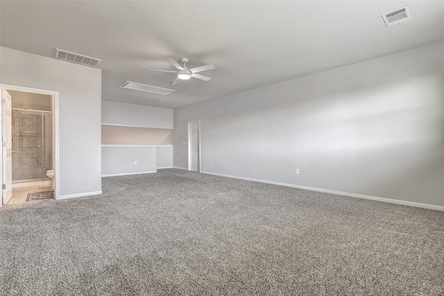 empty room featuring ceiling fan and carpet flooring