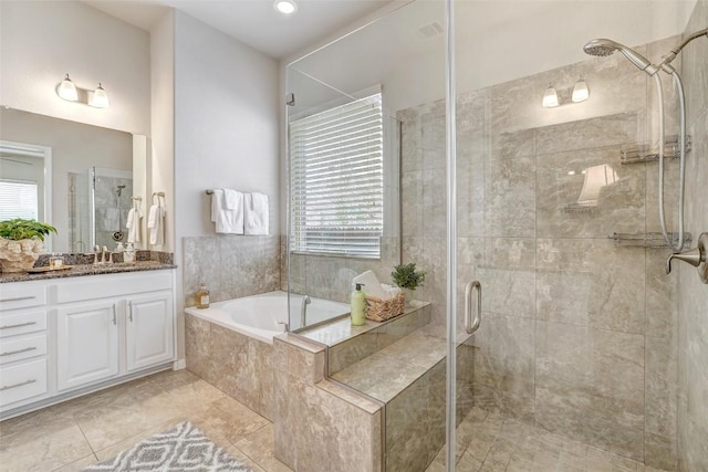 bathroom with vanity, separate shower and tub, and tile patterned flooring