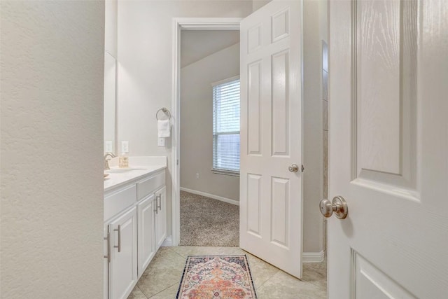 bathroom with vanity and tile patterned floors