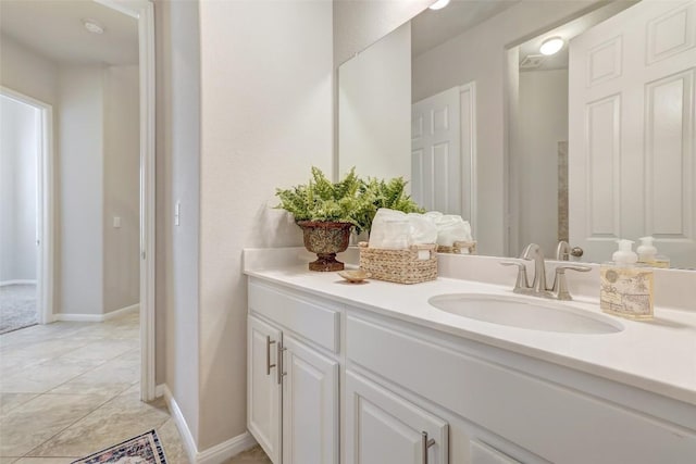 bathroom featuring vanity and tile patterned flooring