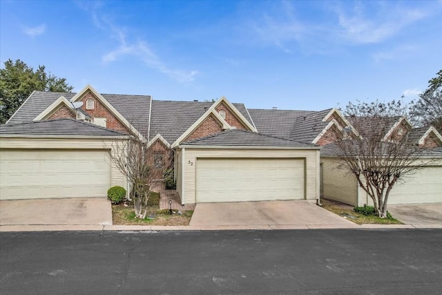 ranch-style home featuring a garage