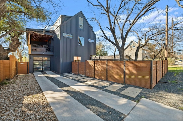 view of home's exterior featuring a balcony