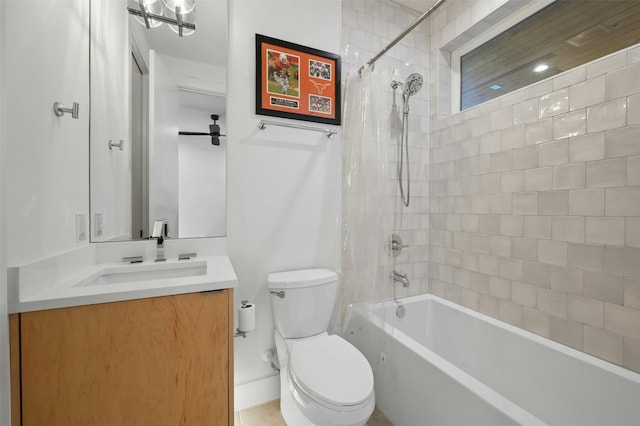 full bathroom with vanity, shower / tub combo, and toilet