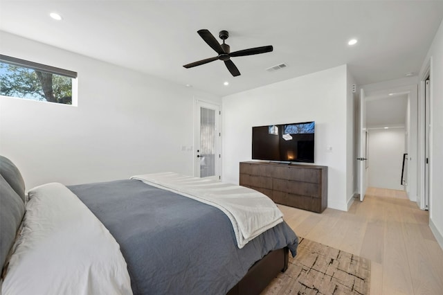 bedroom featuring ceiling fan and light wood-type flooring