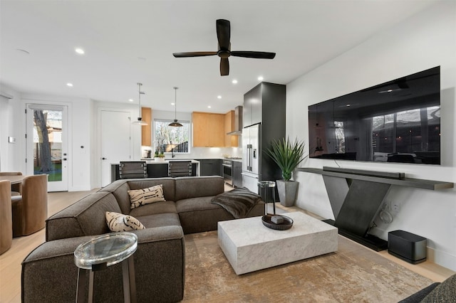 living room featuring ceiling fan