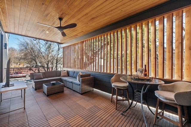 view of patio / terrace featuring an outdoor living space and ceiling fan