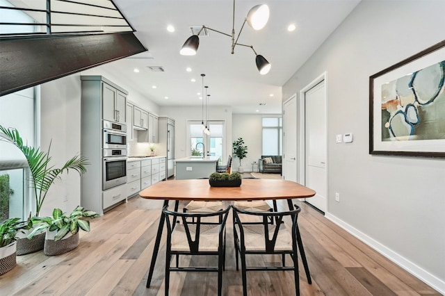 dining room featuring light hardwood / wood-style flooring