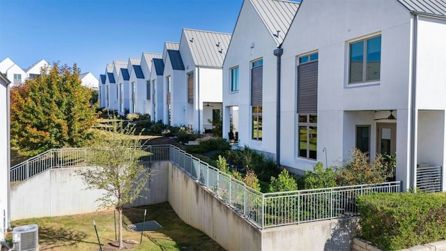 view of property featuring central air condition unit