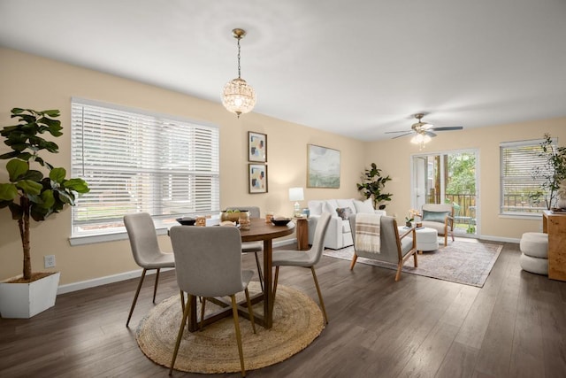 dining area with plenty of natural light, dark wood-type flooring, and ceiling fan