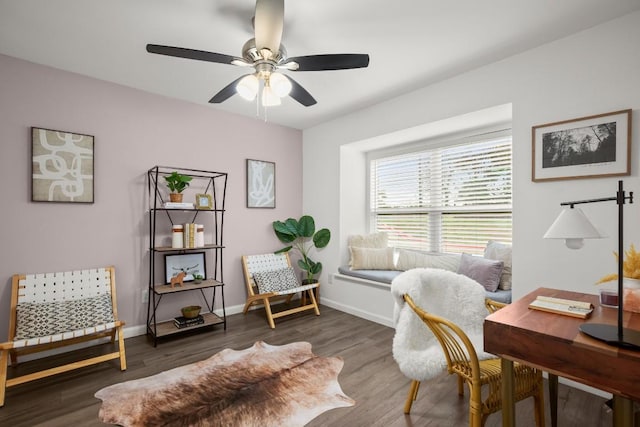 office area featuring ceiling fan and dark hardwood / wood-style floors