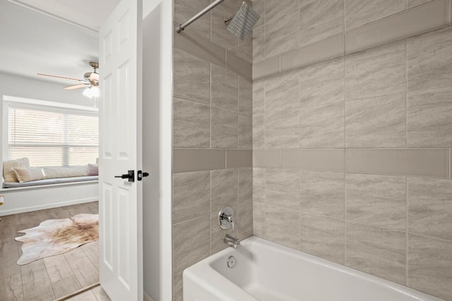 bathroom with hardwood / wood-style floors and ceiling fan