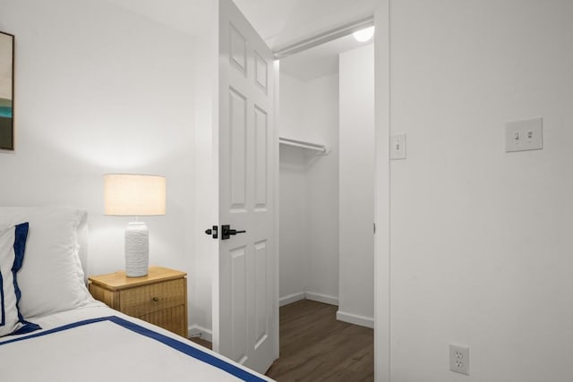 bedroom featuring wood-type flooring