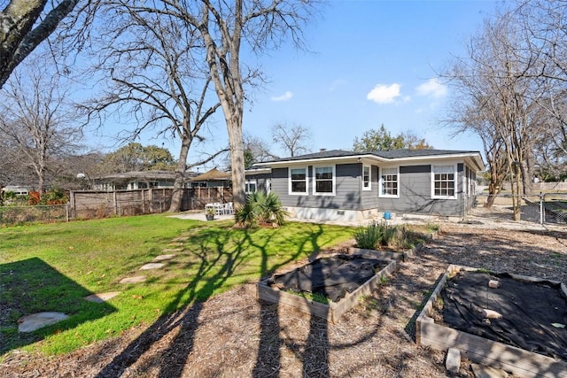 back of house featuring a yard and a patio area