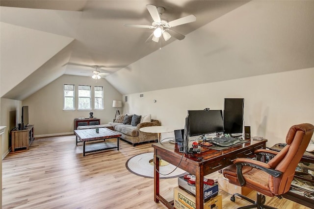 office space with lofted ceiling, ceiling fan, and light wood-type flooring