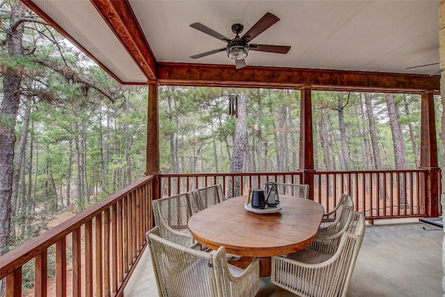 sunroom featuring a wealth of natural light and ceiling fan