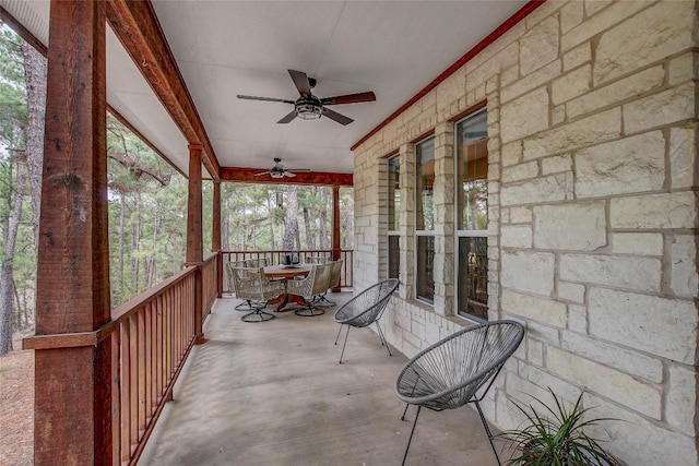 exterior space featuring ceiling fan and covered porch