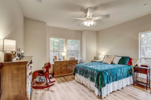 bedroom featuring ceiling fan and light wood-type flooring