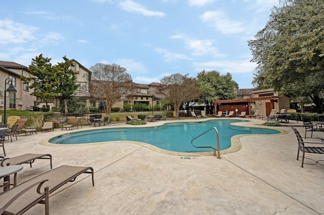 view of pool featuring a patio area