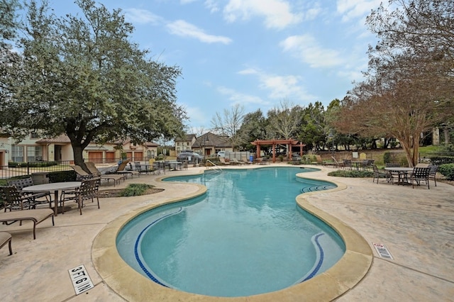 view of pool featuring a patio