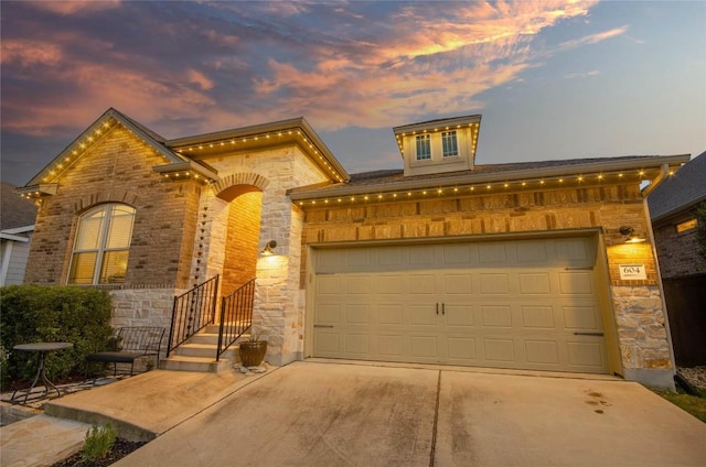 view of front of property featuring a garage