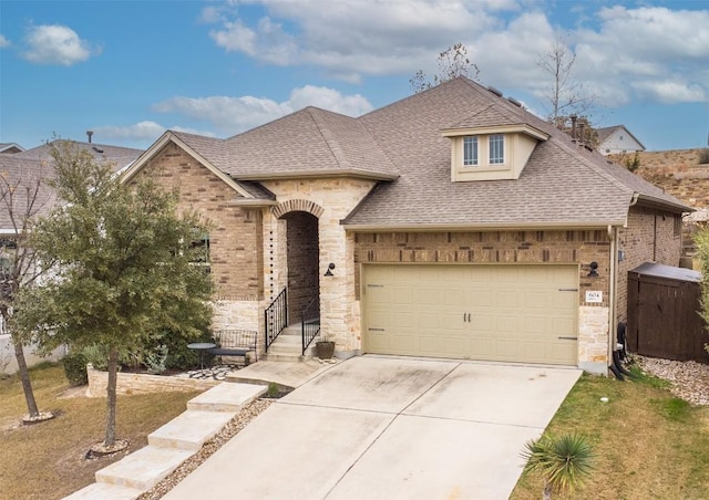 view of front of property with a garage