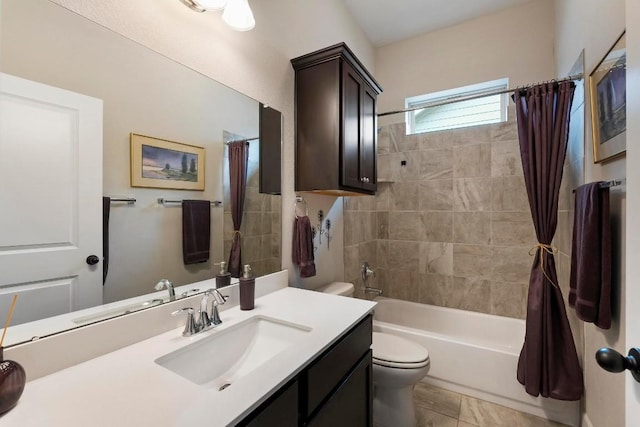 full bathroom with vanity, shower / bath combination with curtain, and toilet