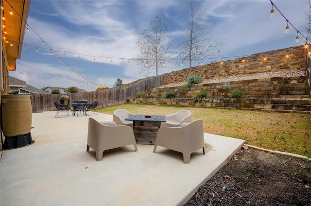 view of patio featuring a fire pit