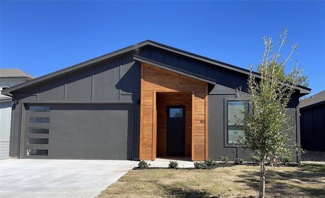 853 Cypress Ln, Cottonwood Shores, TX 78657 - view of front of property with driveway and an attached garage