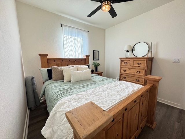 853 Cypress Ln, Cottonwood Shores, TX 78657 - bedroom featuring dark wood-style floors, baseboards, and ceiling fan