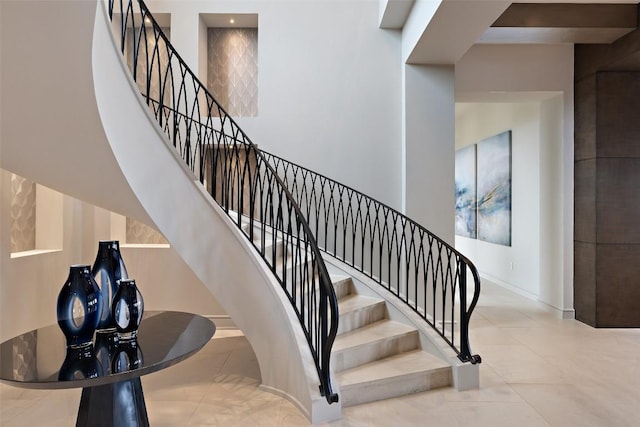 4901 Mirador Dr, Austin, TX 78735 - stairs featuring baseboards and tile patterned flooring