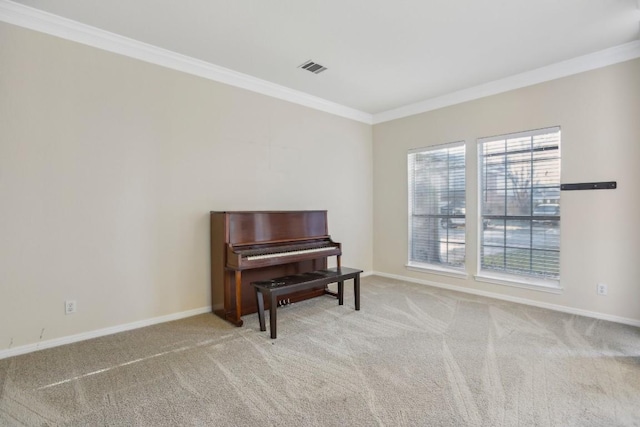 miscellaneous room with light carpet and crown molding