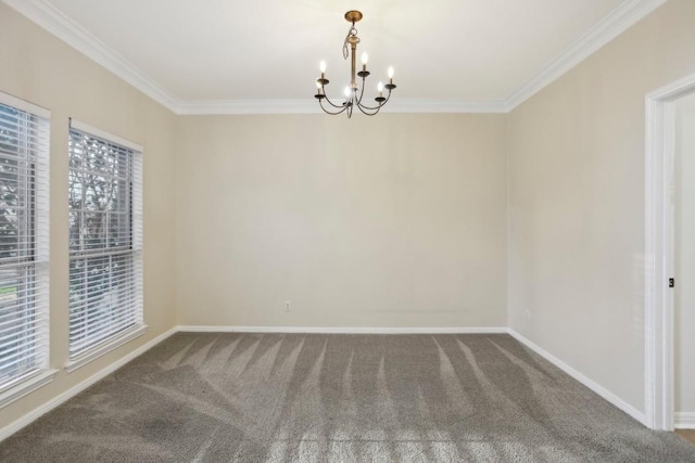 empty room featuring an inviting chandelier, crown molding, and carpet