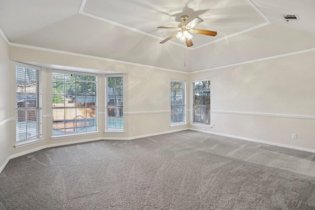 spare room with lofted ceiling, ornamental molding, and carpet