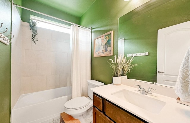 full bathroom featuring shower / bathtub combination with curtain, vanity, and toilet