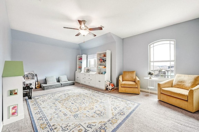 playroom with carpet floors and ceiling fan