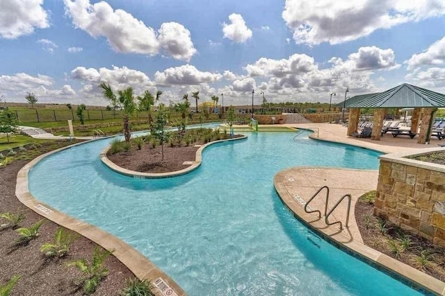 view of swimming pool with a gazebo