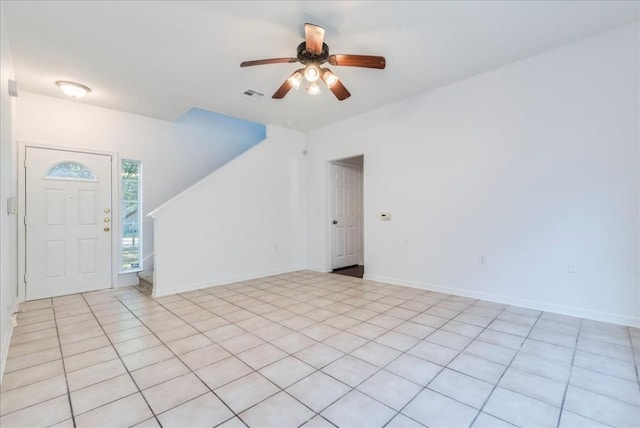 entrance foyer featuring ceiling fan