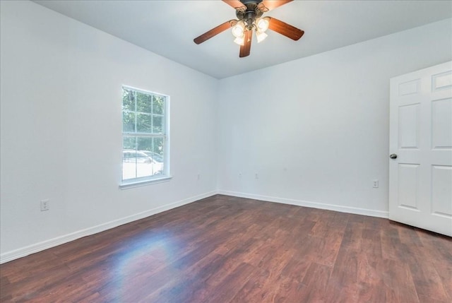 unfurnished room featuring ceiling fan and dark hardwood / wood-style floors