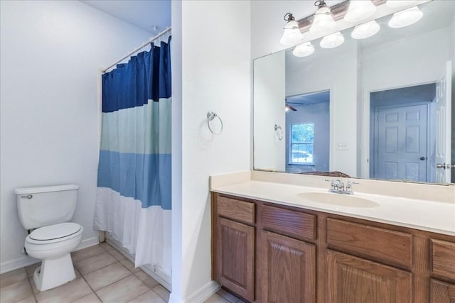 bathroom featuring tile patterned flooring, vanity, curtained shower, and toilet