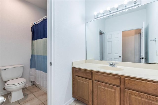 bathroom with tile patterned flooring, vanity, a shower with curtain, and toilet