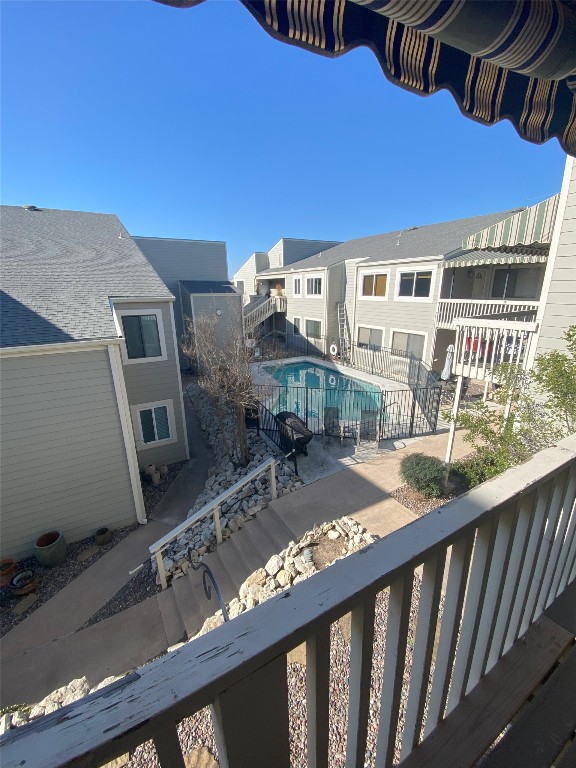 5801 Thunderbird St Unit A15, Lago Vista, TX 78645 - balcony featuring view of pool
