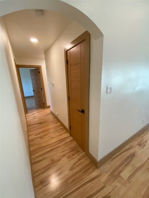 5801 Thunderbird St Unit A15, Lago Vista, TX 78645 - corridor with light wood finished floors and arched walkways