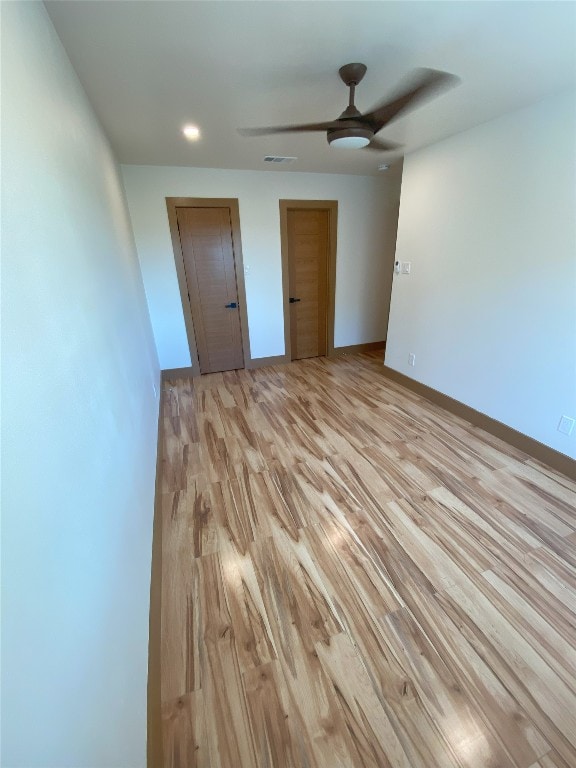 5801 Thunderbird St Unit A15, Lago Vista, TX 78645 - spare room with light wood-style floors, a ceiling fan, and recessed lighting
