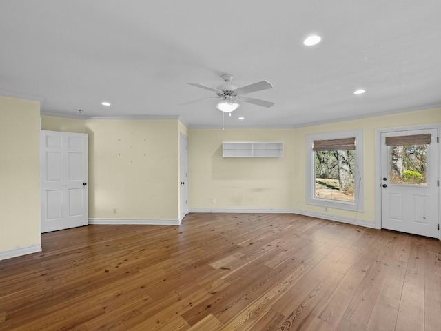 interior space featuring hardwood / wood-style floors and ceiling fan