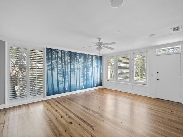 entrance foyer with hardwood / wood-style flooring and ceiling fan