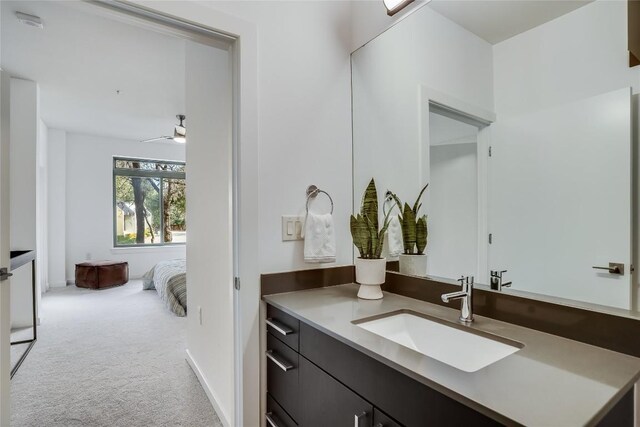 3600 S Lamar Blvd Unit 115, Austin, TX 78704 - ensuite bathroom featuring vanity and ceiling fan