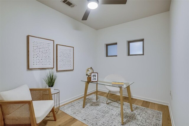 3600 S Lamar Blvd Unit 115, Austin, TX 78704 - office space featuring wood finished floors, a ceiling fan, and baseboards