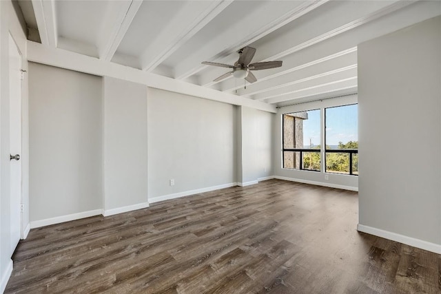 unfurnished room featuring beamed ceiling, ceiling fan, and dark hardwood / wood-style flooring